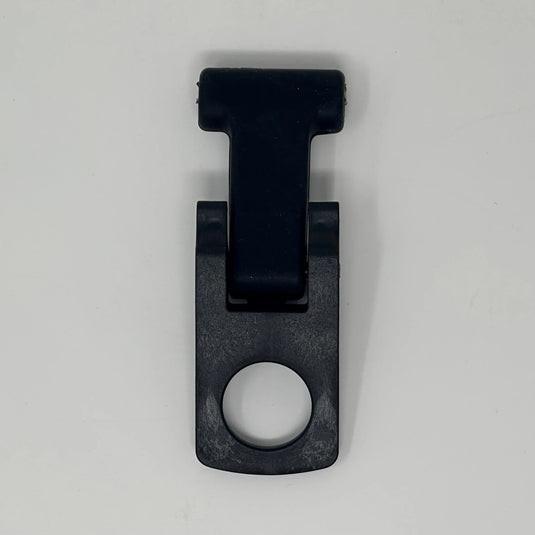 Black plastic cooler latch with a circular hole on white background