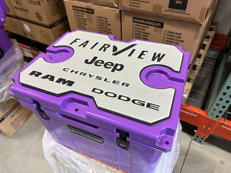 Load image into Gallery viewer, Purple WhiteRock cooler with Fairview Jeep Chrysler Ram Dodge logo in a warehouse setting
