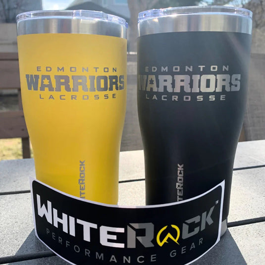 Yellow and black Edmonton Warriors Lacrosse insulated tumblers on outdoor table with WhiteRock Performance Gear sticker