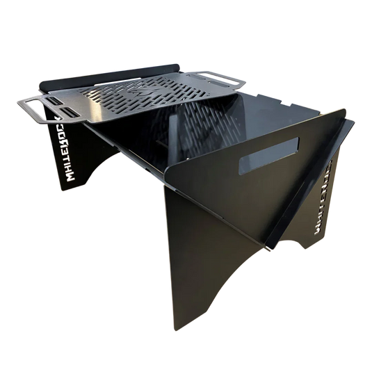 Black portable metal camping grill with a vented cooking grate and side handles