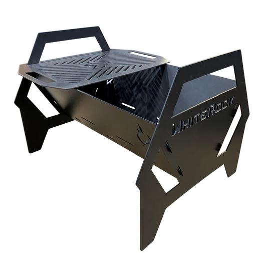 Black metal WhiteRock fire pit with removable grilling plate and laser-cut handles