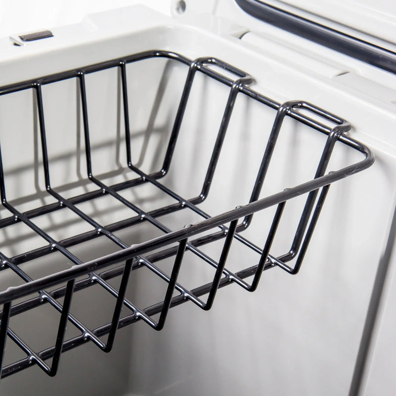 Load image into Gallery viewer, Close-up of a black metal storage basket inside a white freezer compartment
