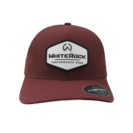 Maroon WhiteRock performance gear baseball cap with black and white logo patch front view